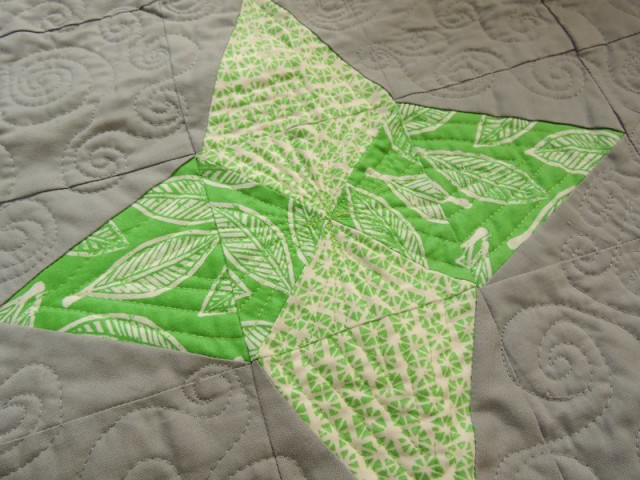 Aurora BOM triangle in a square quilting