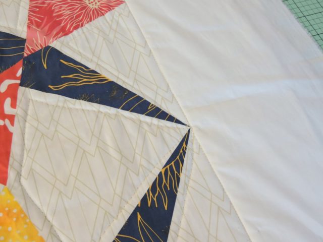 Quilting a quilt panel edges