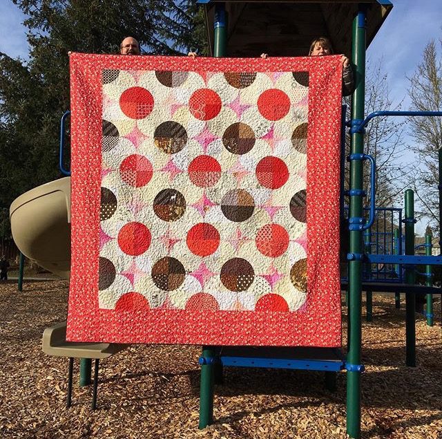 Large one block wonder quilt using the Fizzy pattern free at BlossomHeartQuilts.com