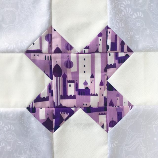 Purple Lizzy House Tic Tac Toe quilt block for a quilting bee using the pattern at BlossomHeartQuilts.com