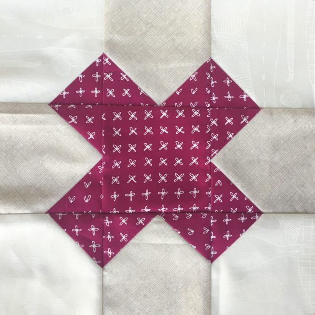 Purple Tic Tac Toe quilt block for a quilting bee using the pattern at BlossomHeartQuilts.com