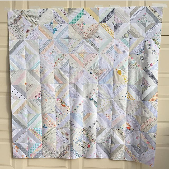 Low volume quilt by alysj made from the Treasure Hunt quilt block tutorial by BlossomHeartQuilts.com