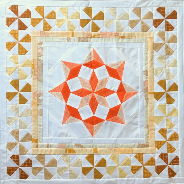 Windmills in Girt By Sea modern medallion quilt pattern in Carolyn Friedlander by BlossomHeartQuilts.com