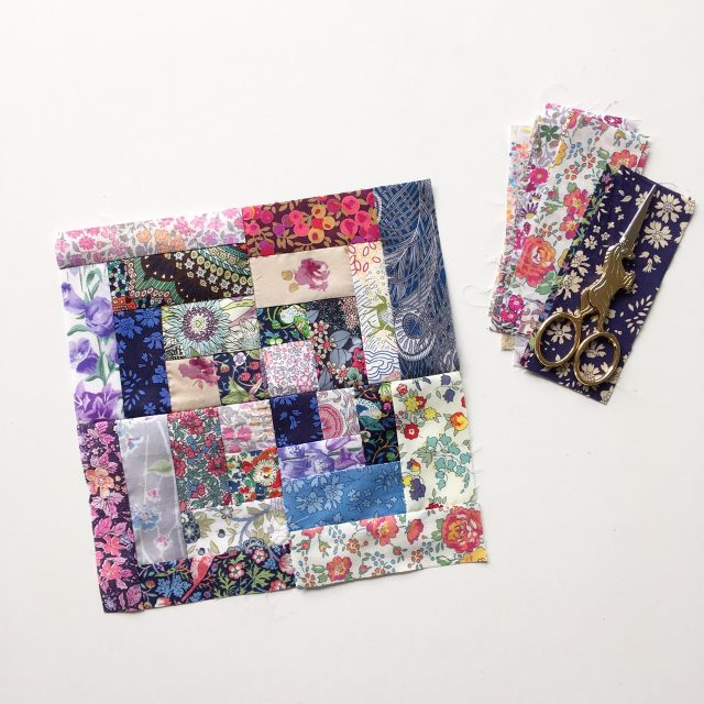 Liberty scraps log cabin quilt block by BlossomHeartQuilts.com