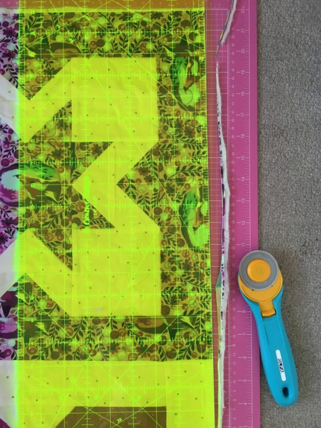 Trim a quilt top to bind