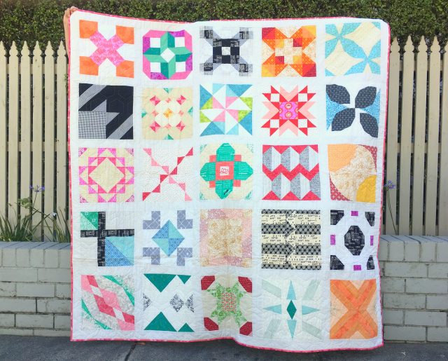 A 12'' block sampler quilt by Blossom Heart Quilts