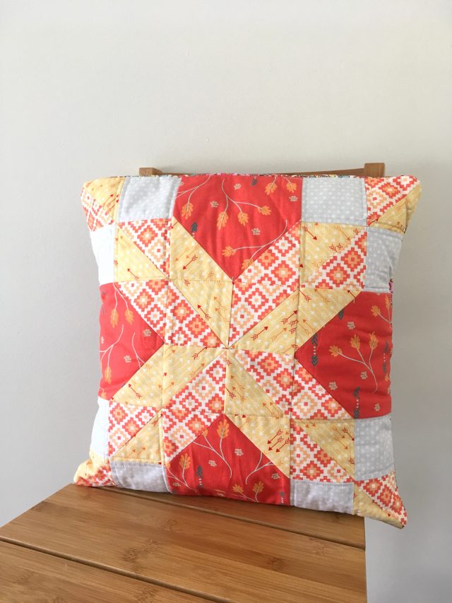 A quilted bithday present cushion