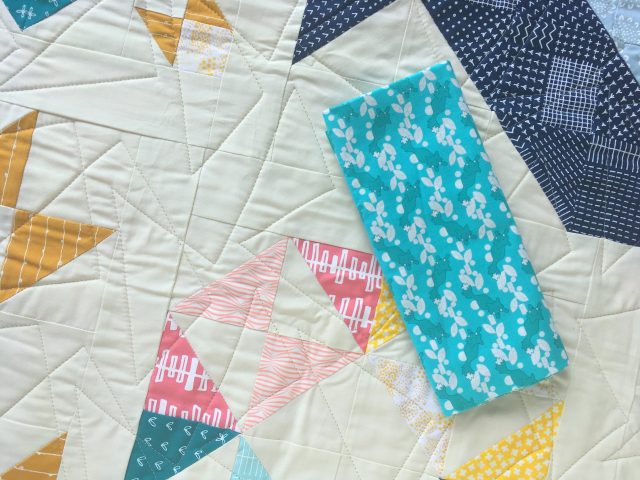 Teal binding for Modern HST Sampler quilt by Blossom Heart Quilts