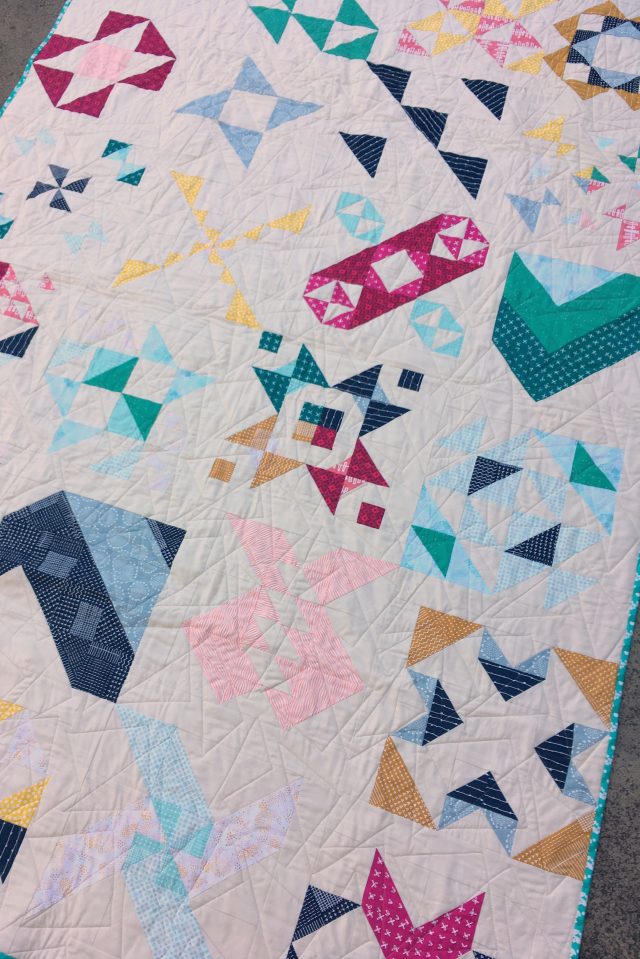 Half square triangle sampler quilt
