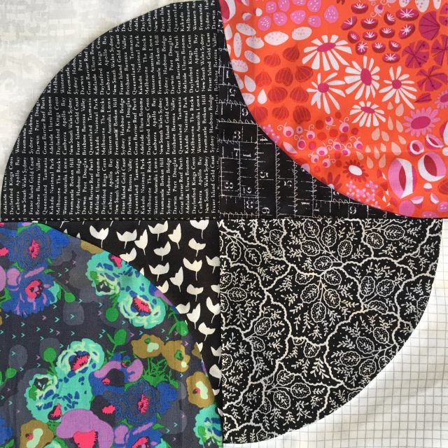 Fizzy quilt block in black and white colourful florals