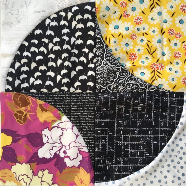 Fizzy quilt block in black and white florals