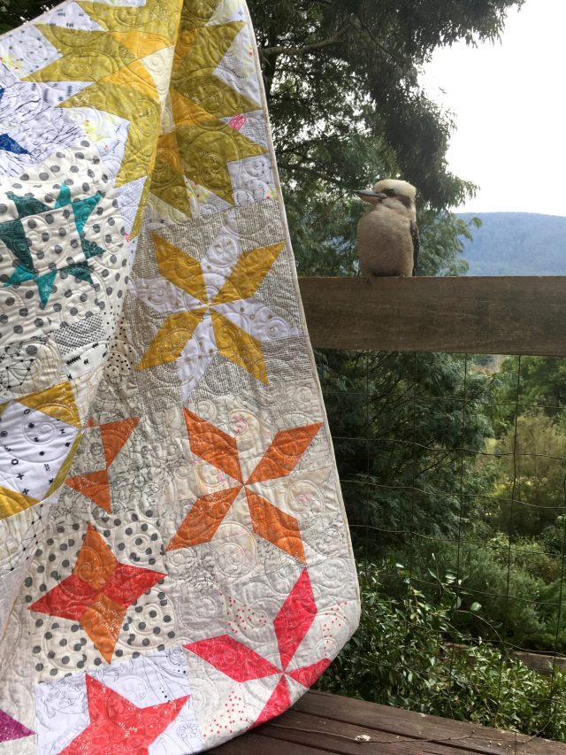 Kookaburra and Alison Glass rainbow Aurora quilt by BlossomHeartQuilts.com