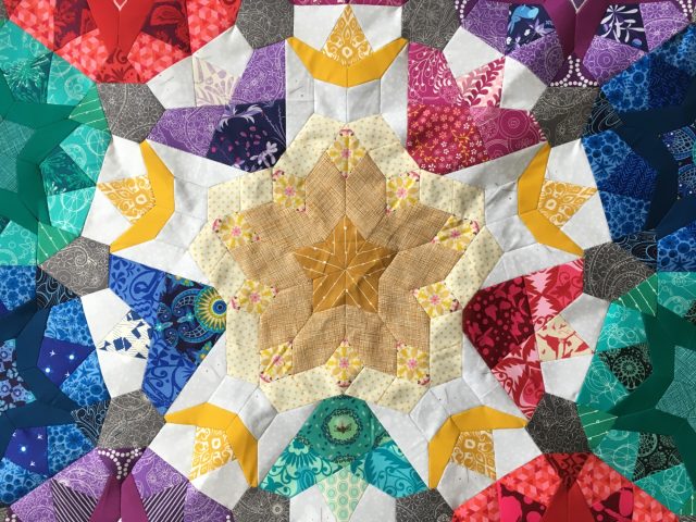 Pollinate quilt main rosette by BlossomHeartQuilts.com