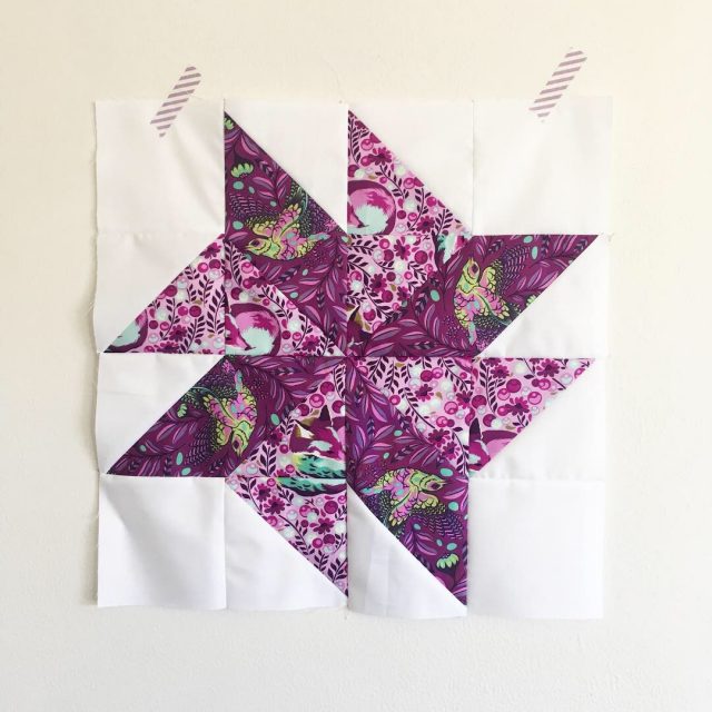 Purple star quilt block from month 2 of rainbow quilt blocks using Tula Pink and pattern by BlossomHeartQuilts.com