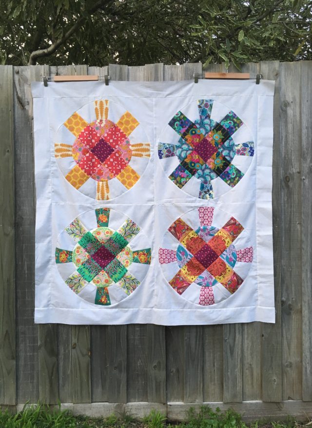 Colourful modern baby quilt