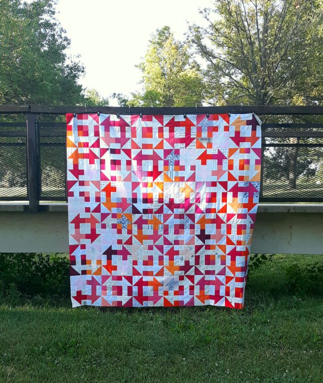 Modern churn dash quilt