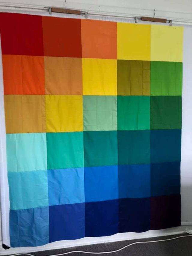 Rainbow solids quilt