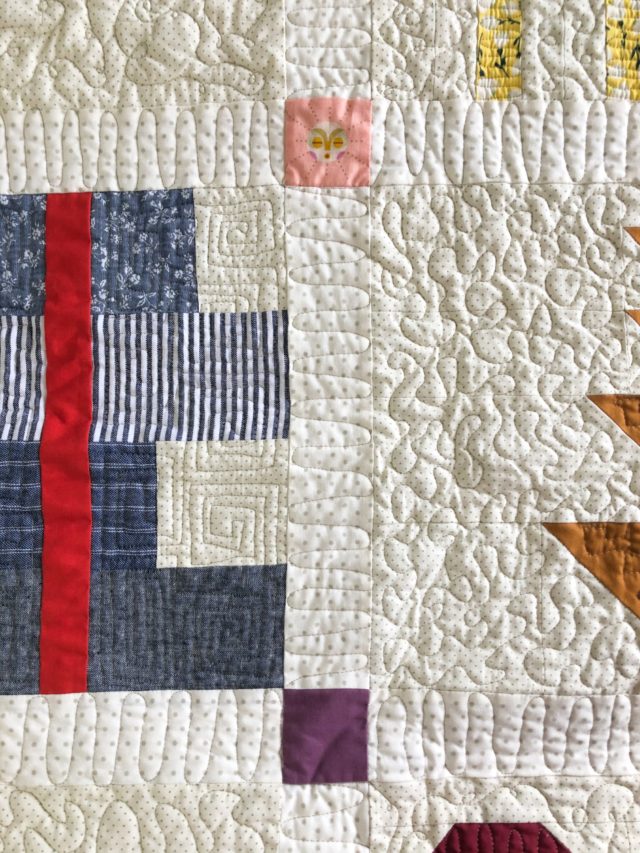 Free motion quilting in sashing