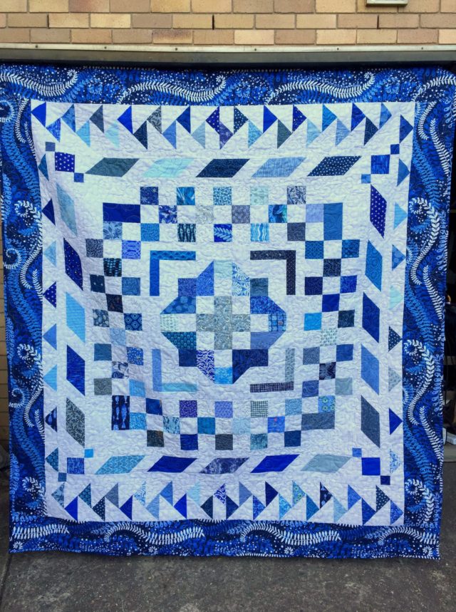 Blue and white medallion quilt