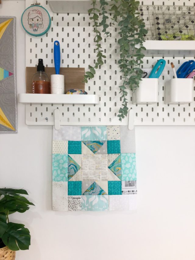 Scrappy teal quilt block