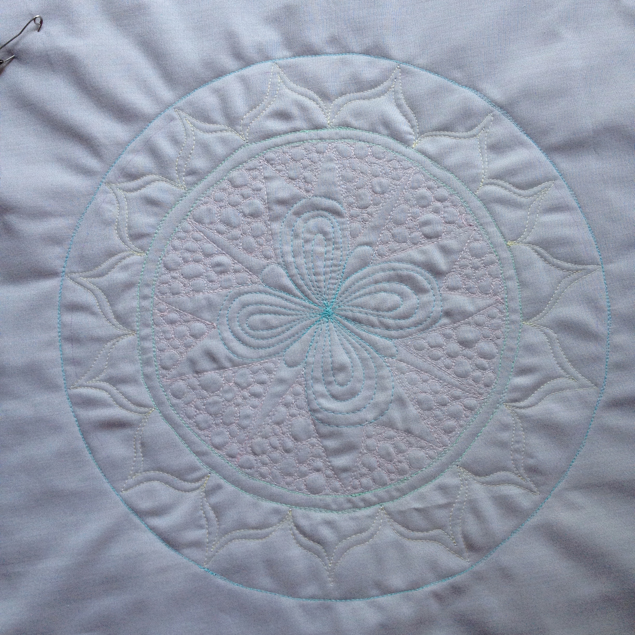 An Aurifil Mandala Wholecloth Mini Quilt